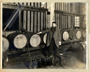 Rabbi with wine casks